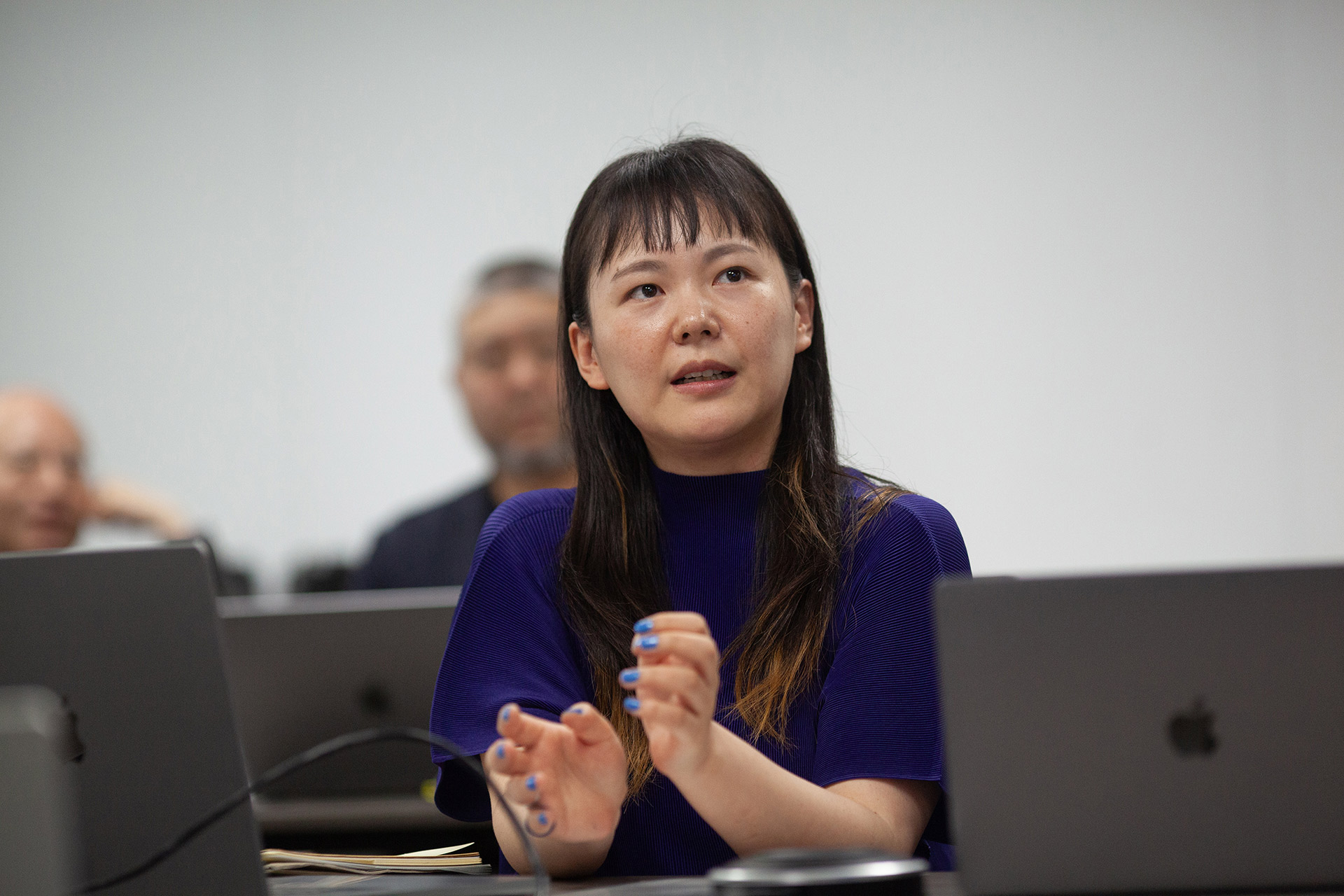 Aoyagi giving a presentation